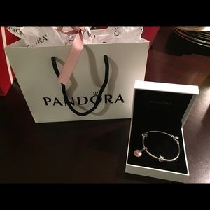 Iconic Pandora bracelet set with Grad ‘18 charm.